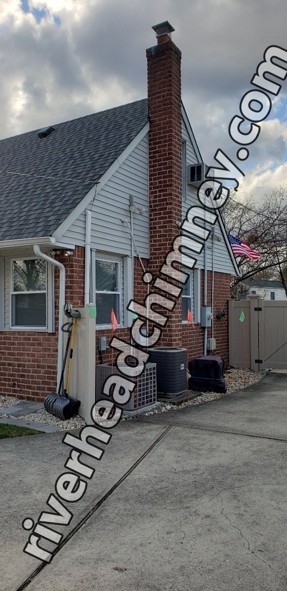 Professional chimney repointing restoring brick joints in Riverhead, NY